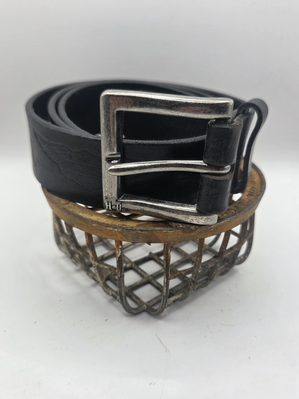 Black leather Harley-Davidson belt featuring a silver-tone metal buckle